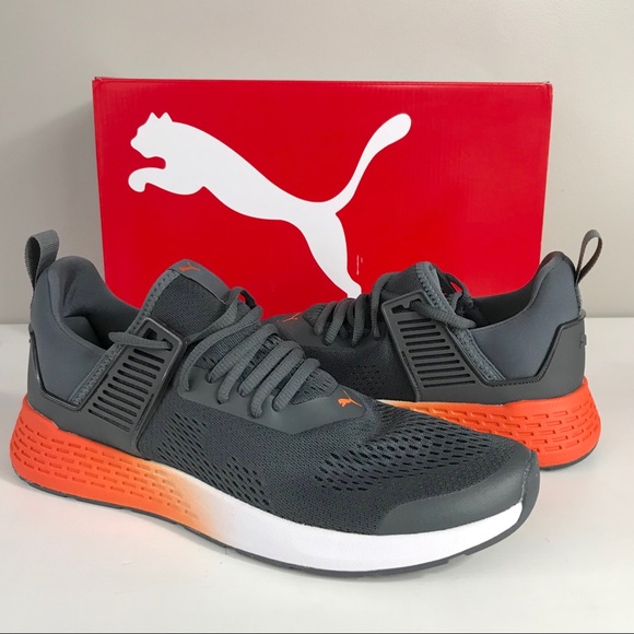 grey and orange puma shoes